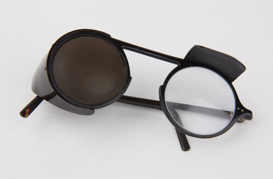 Pair of plastic framed eye-patch spectacles with blanked-out