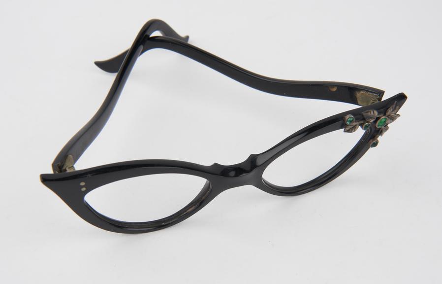 Pair of plastic spectacles frames without lenses, female style