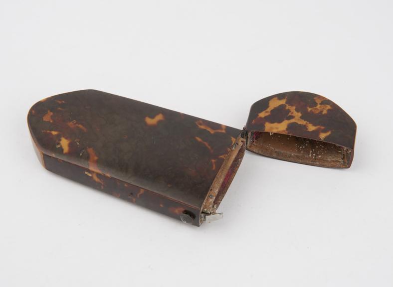 Tortoiseshell spectacle case with button catch and metal collar