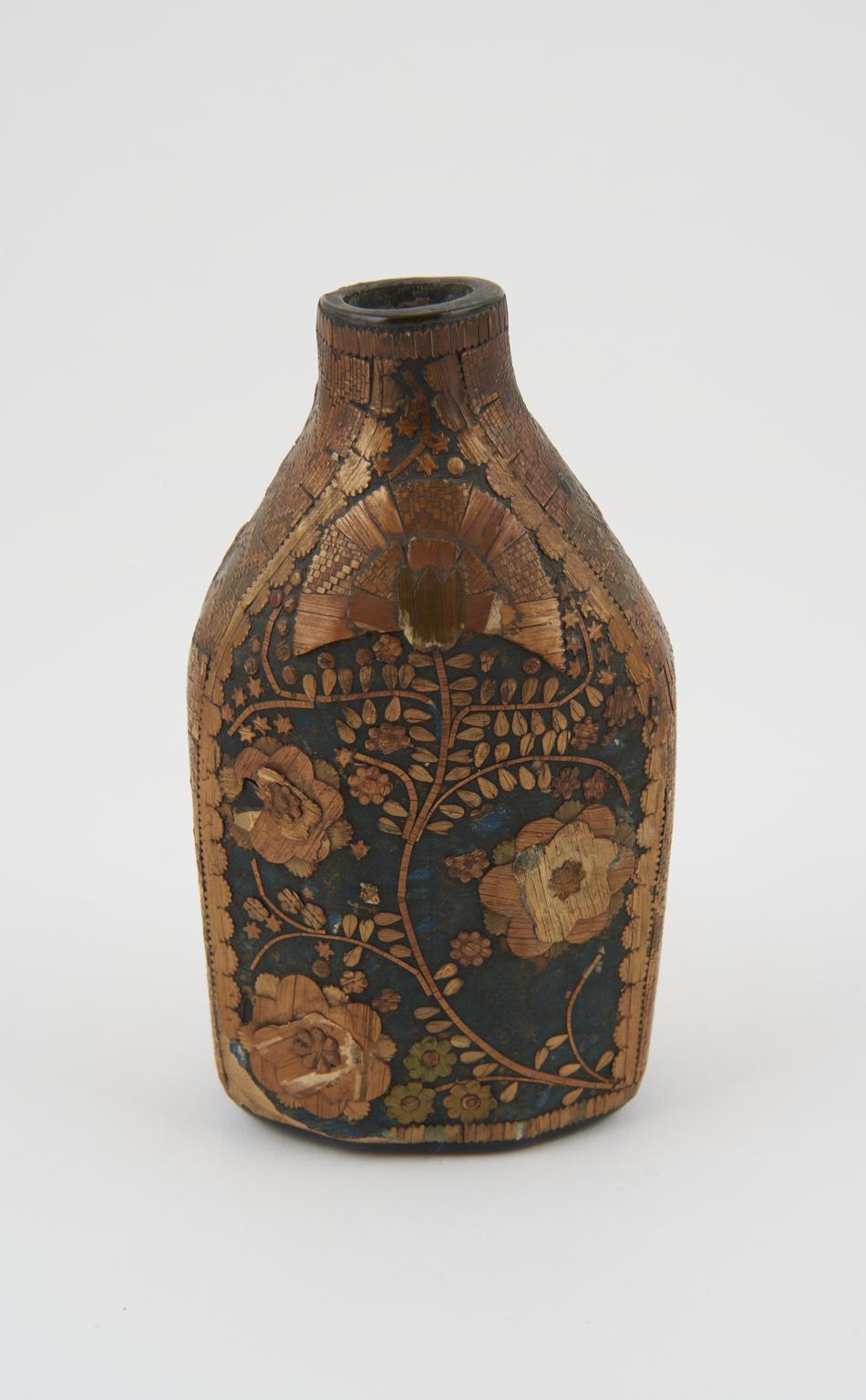 Decorated glass bottle