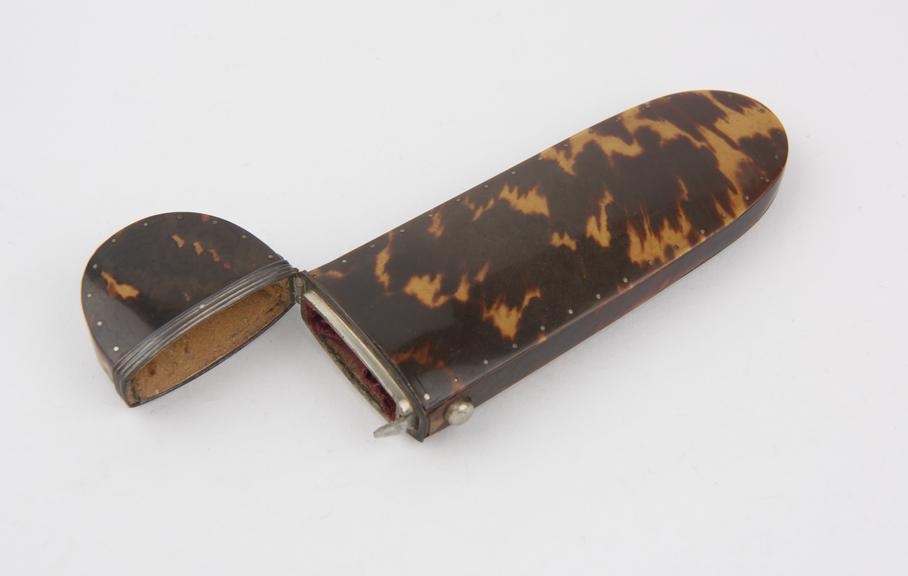 Tortoiseshell spectacle case with button catch and metal collar