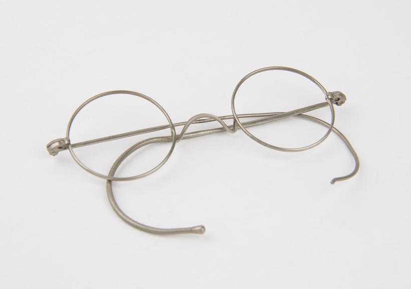 Pair of round-rim metal spectacle frames with wire arms