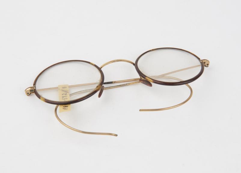 Pair of  round rimmed spectacles with metal frames