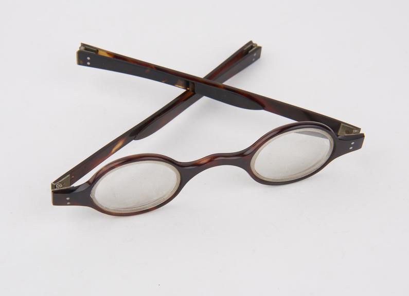 Pair of tortoiseshelll rimmed spectacles