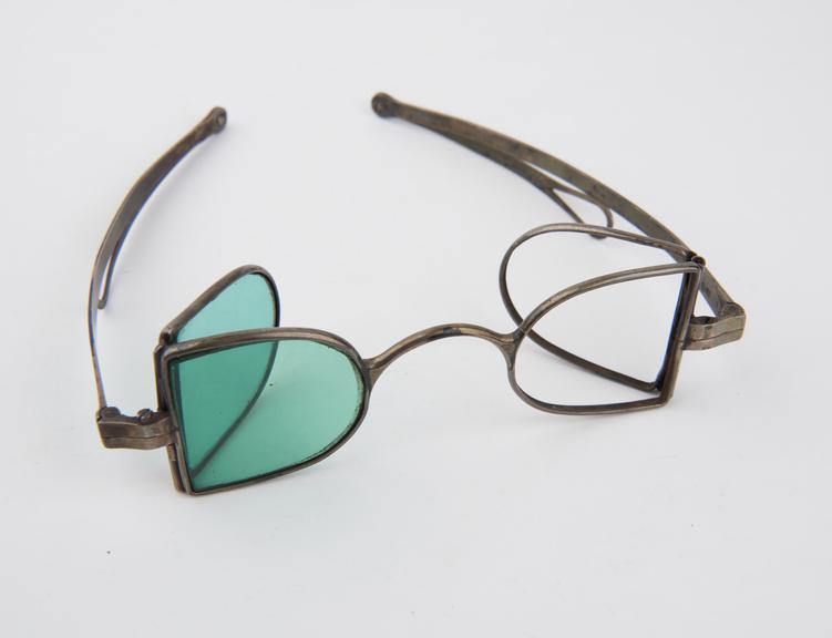 Pair of silver framed protective spectacles (sun glasses?)