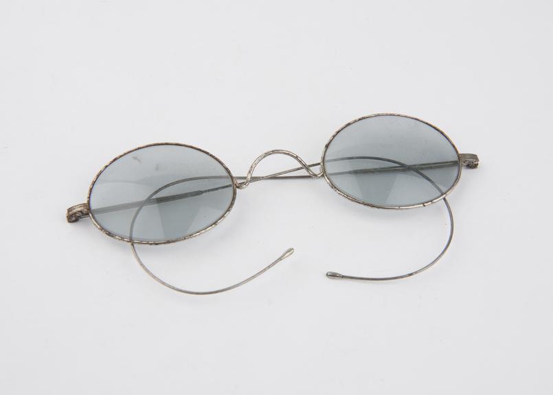 Pair of oval rimmed spectacles with steel frames