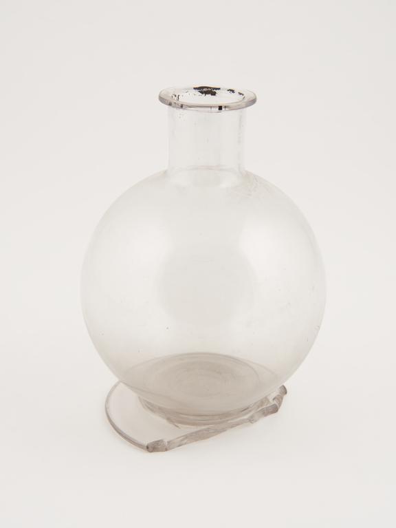 Glass bottle, possibly pharmaceutical