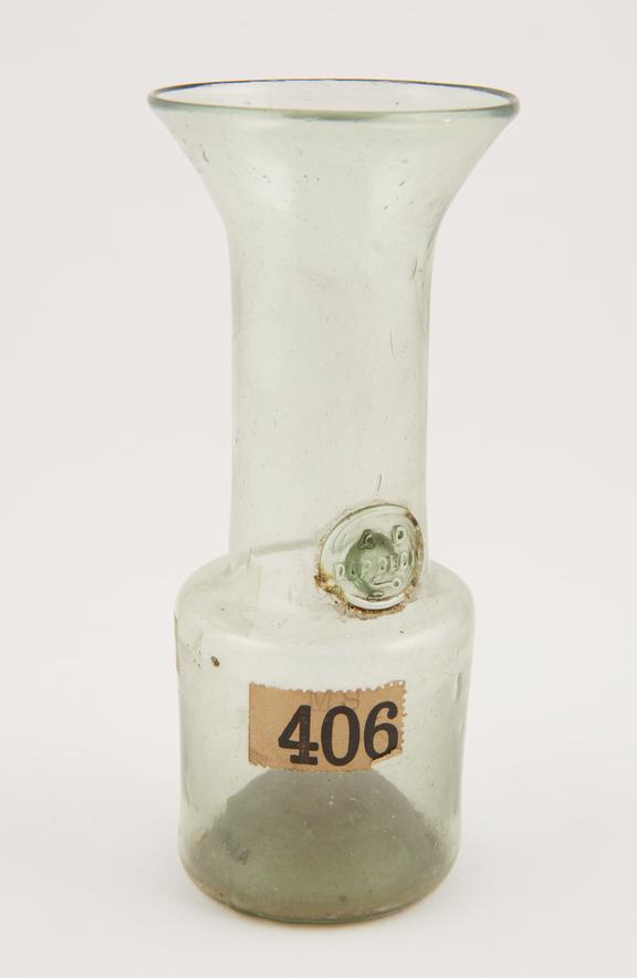 Bottle with funnel-shaped neck, possibly pharmaceutical