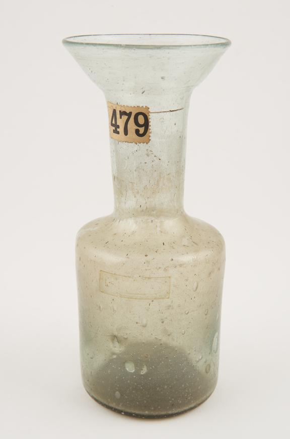 Bottle with funnel-shaped neck, possibly pharmaceutical