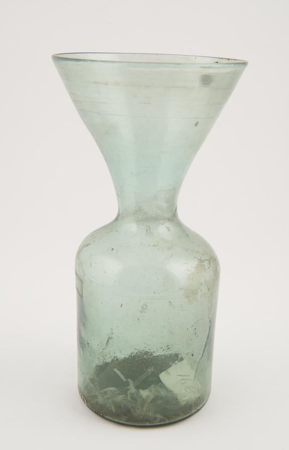 Bottle with funnel-shaped neck, possibly pharmaceutical