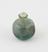 Green glass bottle, conical with broad rim, handblown