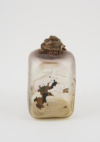 Glass bottle, cork bung, label worn away