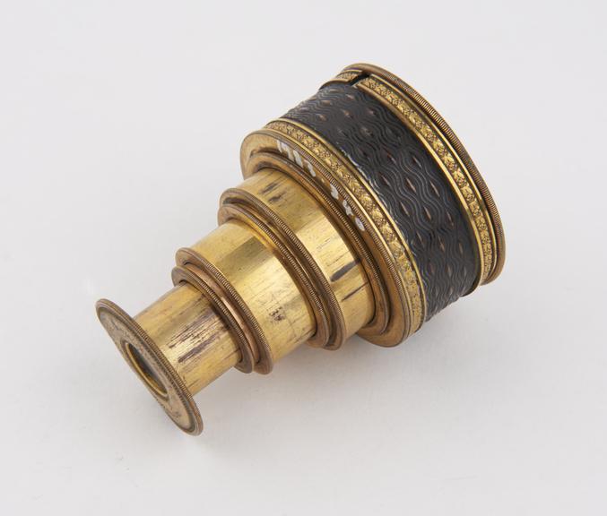 Six draw miniature brass gilt spyglass, Moore and Starkey