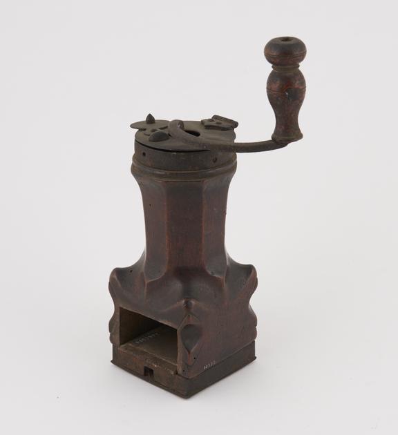 Carved wooden mill with removable handle and hinged lid with