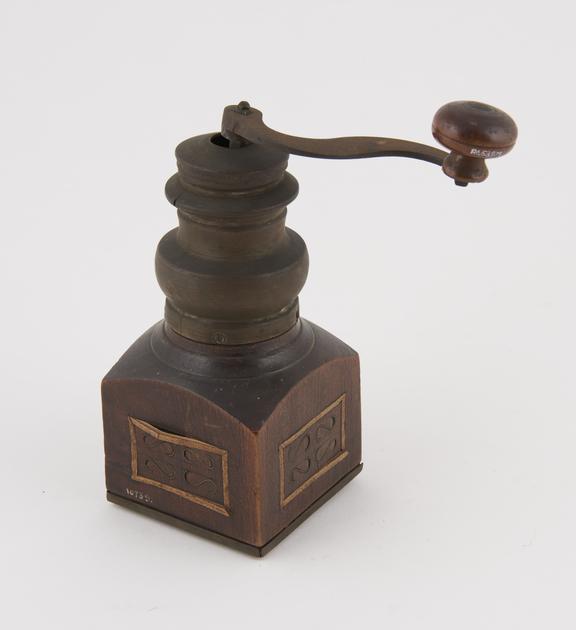 Wooden and brass mill with handle and drawer and inlaid