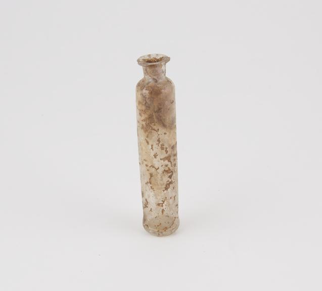 Glass bottle, cylindrical, weathered