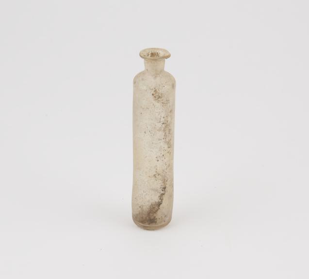 Glass bottle, cylindrical, weathered