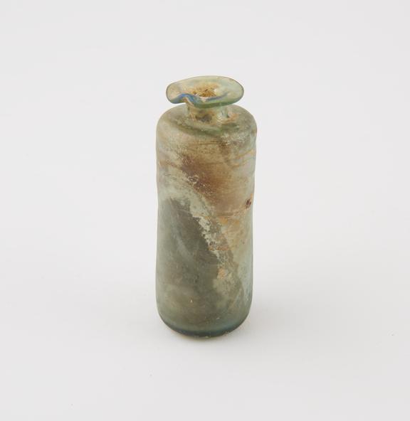Cylindrical, iridescent green glass bottle