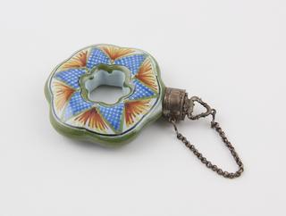 Circular perfume bottle with hole through middle