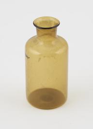 Small cylindrical amber glass bottle | Science Museum Group Collection