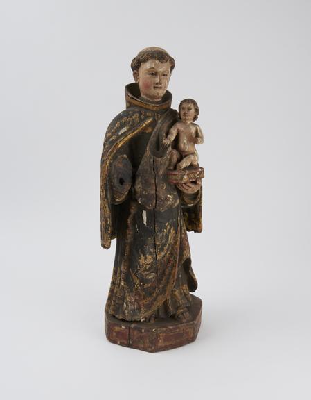 Wooden statue of saint Anthony of Padua with infant Christ