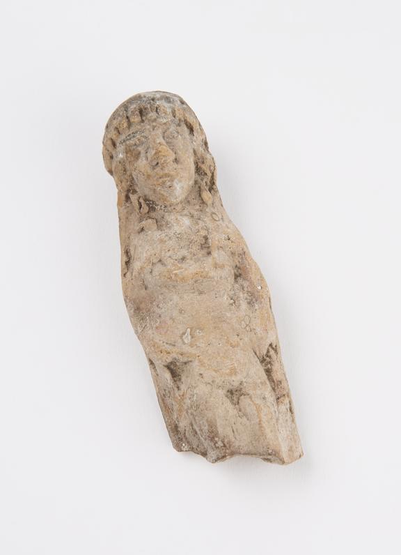 Female statue, possibly Dedalic plaque, terracotta, Cretan
