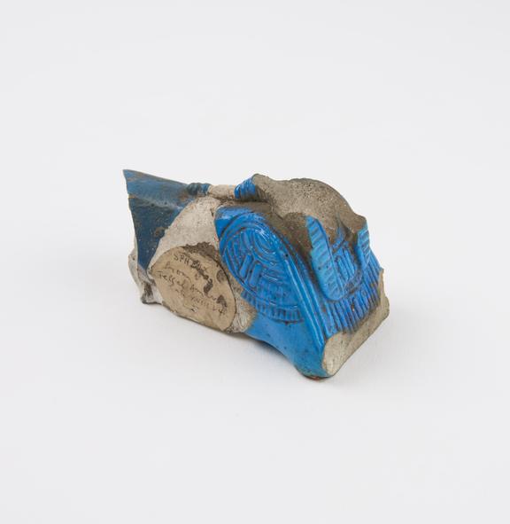 Blue faience sphinx(?) with grooved base, possibly finial