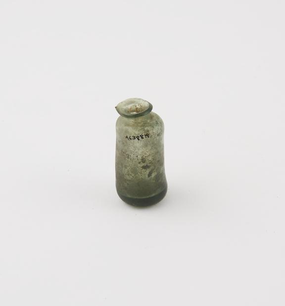 Small green glass bottle, cylindrical, pontil mark, hand blown