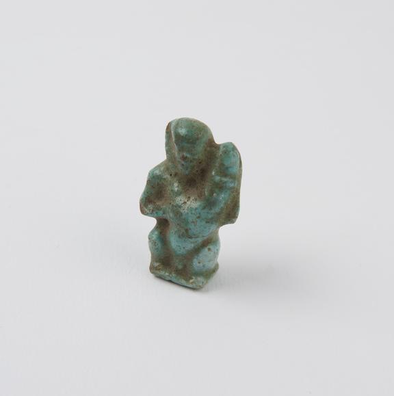 Pendant, small green faience phallic figure