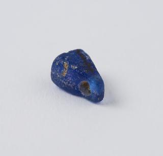 Triangular blue glass bead