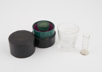 Graduated medicine glass, in box