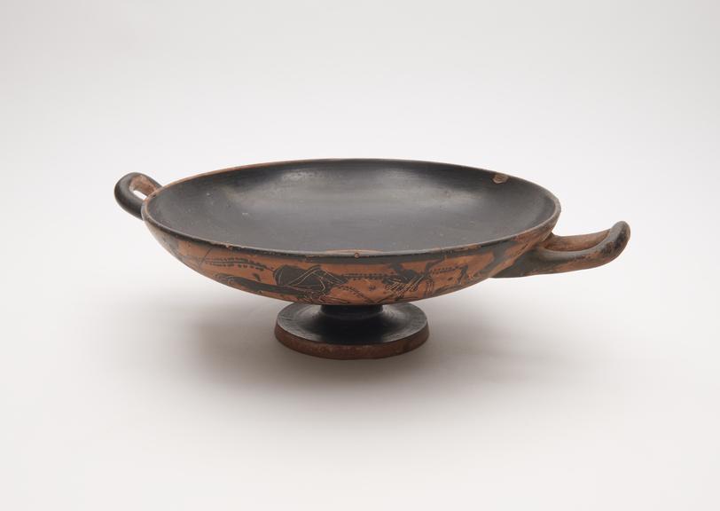 Attic black figure drinking cup (cylix), wide and shallow bowl