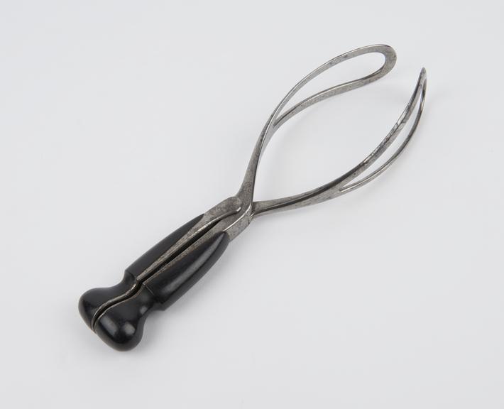 Forceps, obstetrical, Denman, steel and ebony, mid 19th century