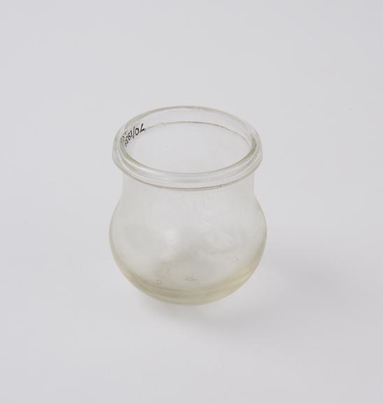 Clear glass bleeding cup bulbous shape