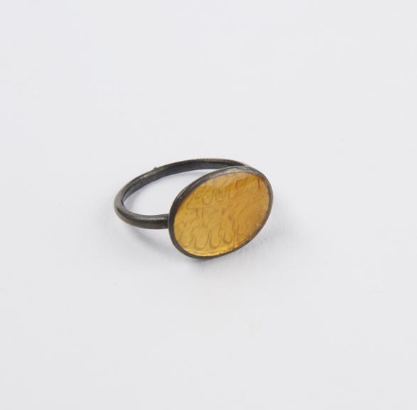 Metal finger ring  with yellow stone