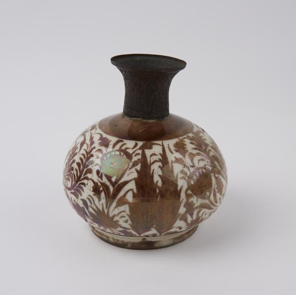 Tin glazed lustreware earthenware bottle, with metal mount