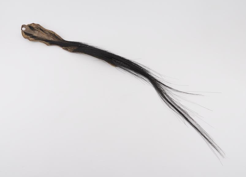 Animal tail amulet used as medicine' by medicine man