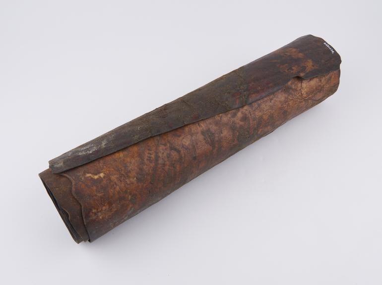 Sheet of hide rolled up into cylinder, used for divination