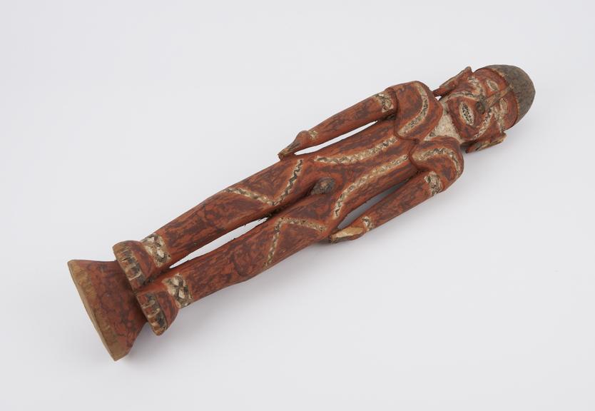 Anthropomaphic, male ancestral figure, one of pair, wooden