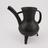 Cast iron jug with 3 legs, long spout and circular handle