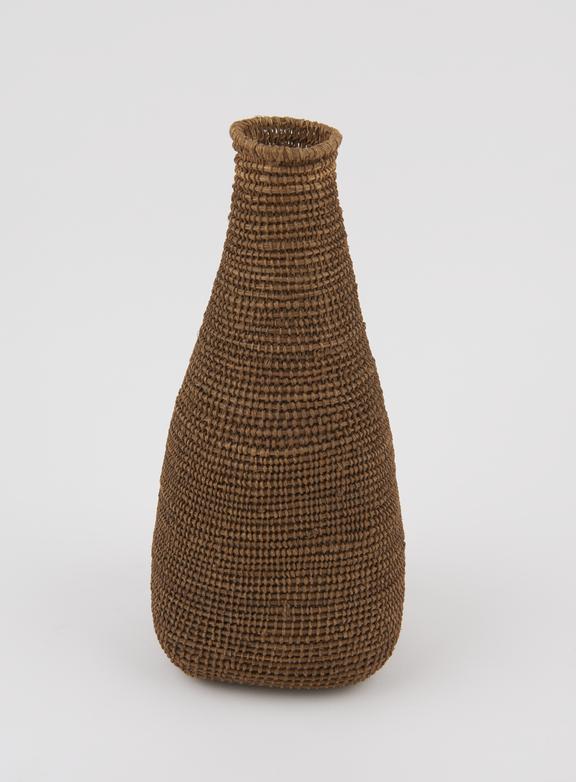 Bottle shaped basket made from grasses and osler (?)