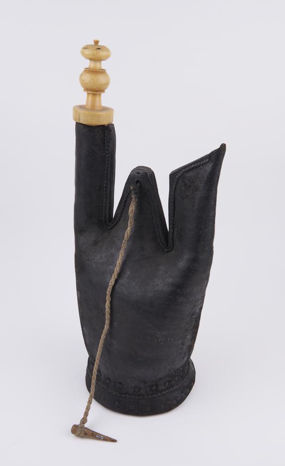 Water bottle, leather, with ivory stopper, African, 1700-1900