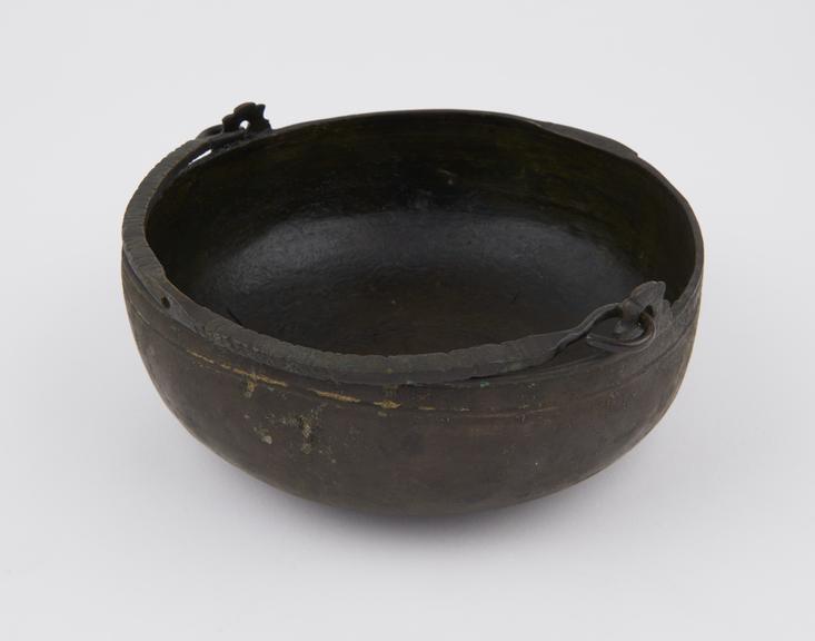 Hanging bowl, brass, with incised decoration on handle