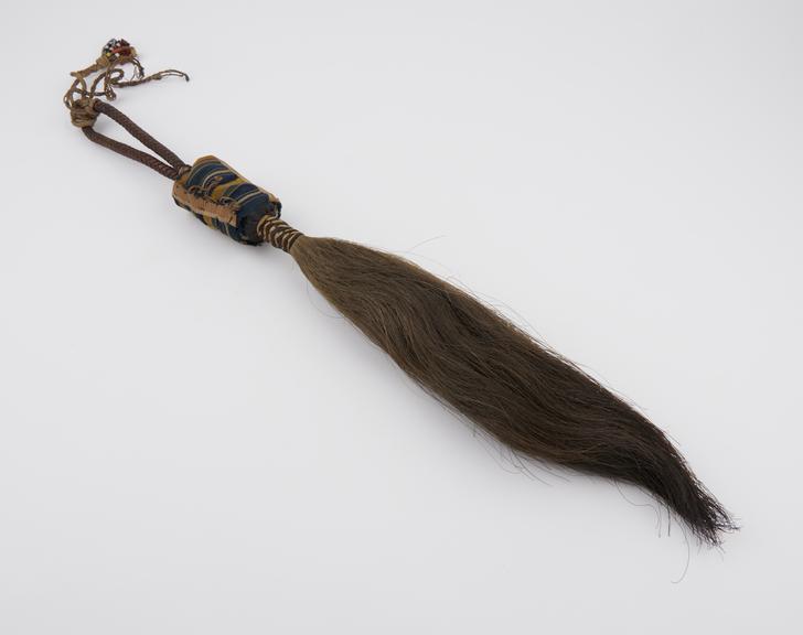 Fly-whisk of horsehair with amulet case on handle, Sudan