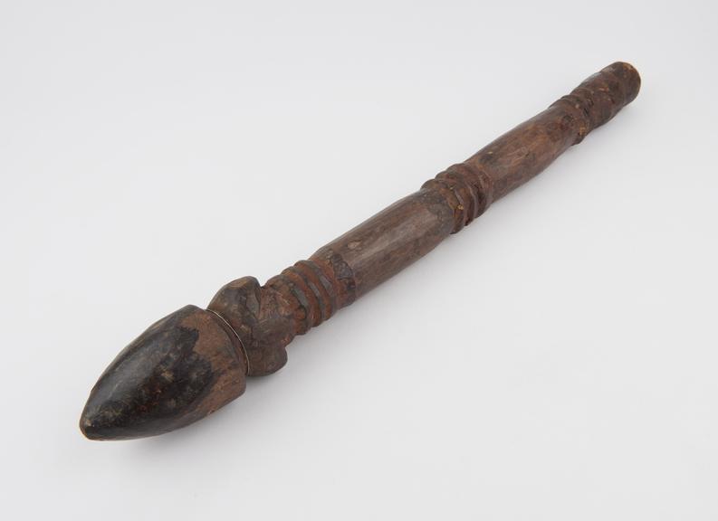 Carved wooden staff or cult-stare