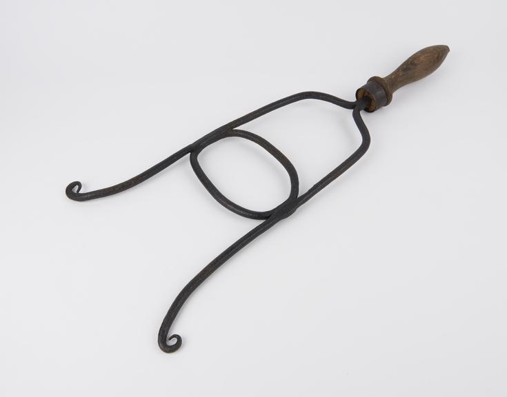 Balling iron, lyre-shaped, steel and wood, British, 19th century