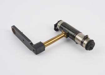 Steel eyepiece, on brass and steel bracket, from Groth's universal apparatus