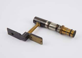 Brass and steel eyepiece, on steel bracket, from Groth's universal apparatus