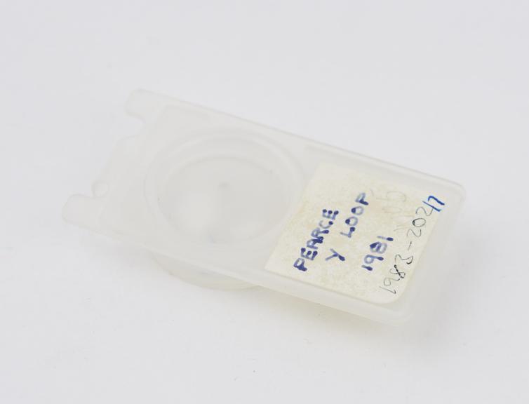 One of  eight intraocular lenses with case