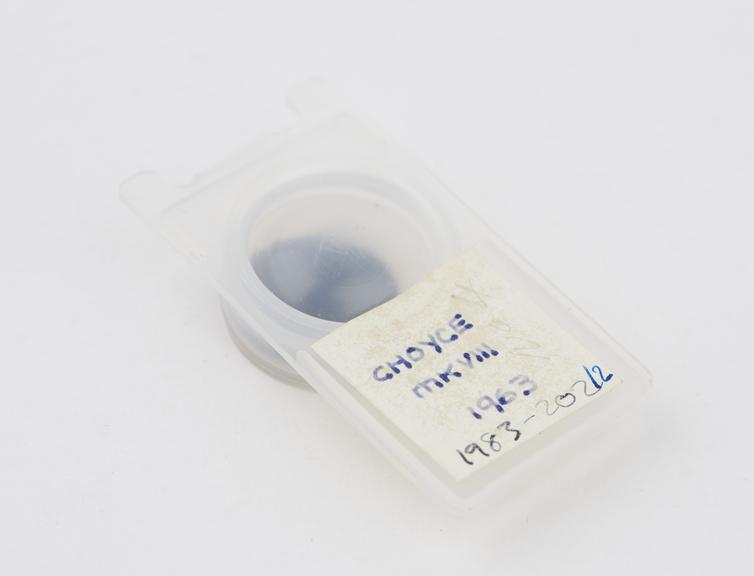 One of  eight intraocular lenses with case